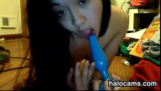 Charming Asian Girl With An Anal Toy